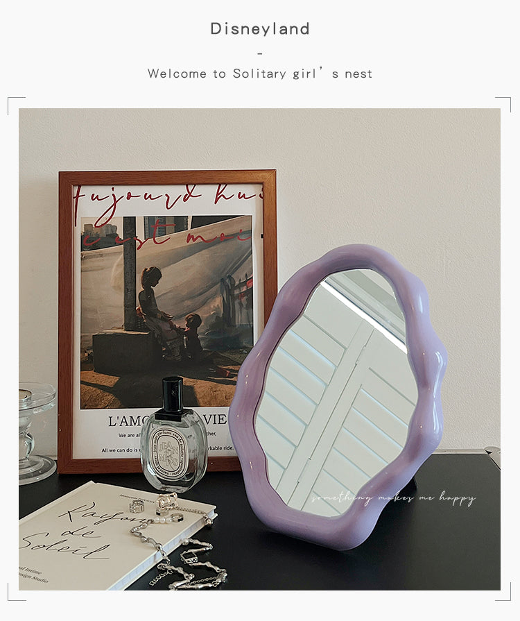 Purple framed mirror